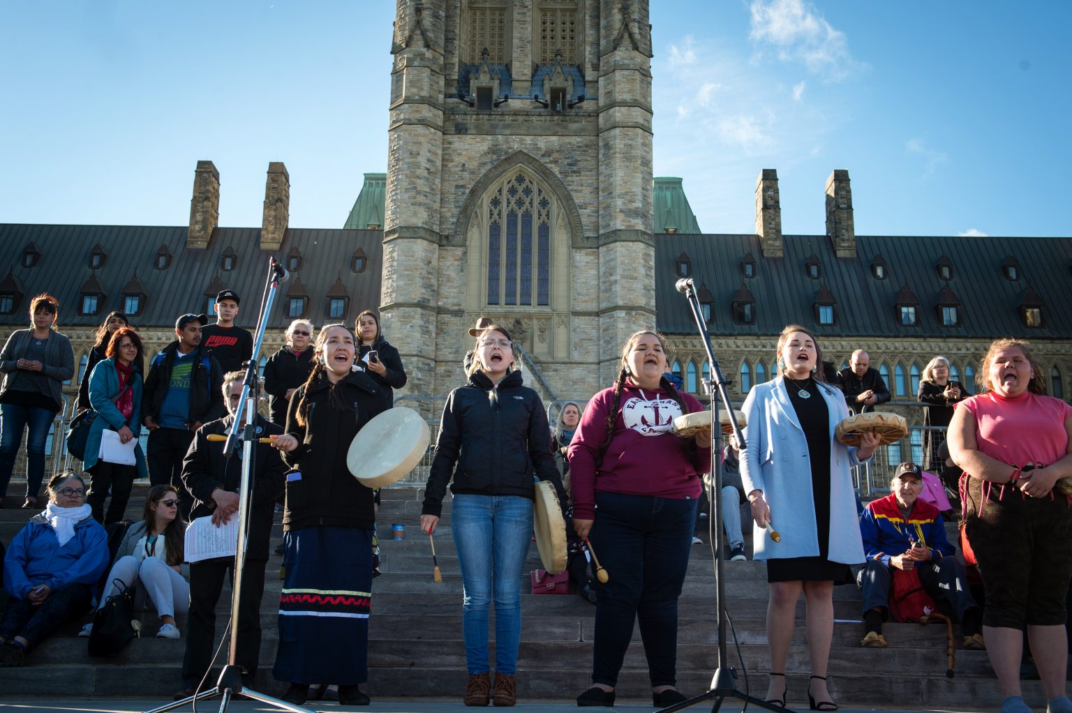 Indigenous women sing and drum during a gathering on Parliament Hill