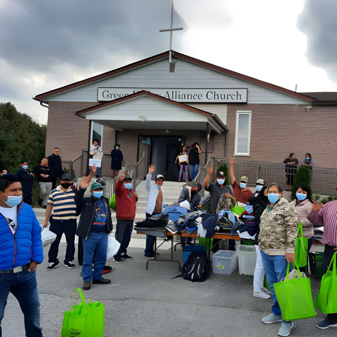 Migrant workers and community members gathering outside Green Valley Alliance Church